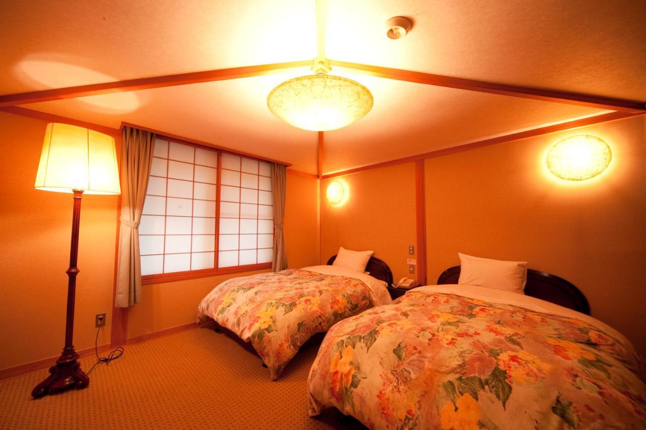 Hotel Ryotei Tanokura Yufu Exterior foto